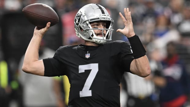 Raiders quarterback Brian Hoyer throws a pass in a game.